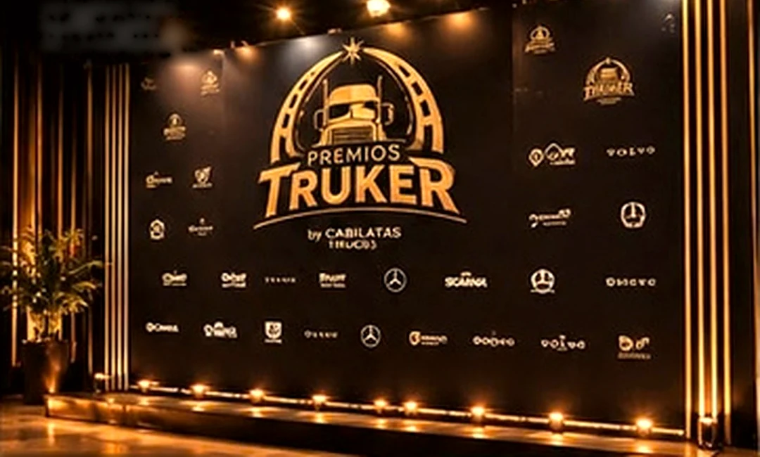 Photocall dorado con el logo de Premios Truker